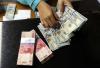 Jelang Imlek, Rupiah Ditutup Jatuh ke Rp13.961 per Dolar AS