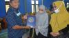Wakil Ketua DPRD Gorontalo Utara Salurkan Bantuan Alquran dan Makanan Tambahan Ibu Hamil 