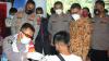 Tinjau Vaksinasi di Unklab, Wakapolda Sulut Ajak Masyarakat Tetap Patuhi Prokes