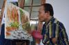 Kisah Sukses Agus Yusuf, Pelukis Difabel yang Berhasil Keliling Dunia Berkat Karyanya