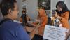 Suasana Pencairan Bantuan Subsidi Upah Rp600.000 Tahap 7 di Kantor Pos