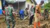 Polres Gorontalo Utara Bersihkan Sampah di Desa Terdampak Banjir