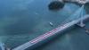 Polri Bentangkan Bendera Merah Putih Raksasa di Jembatan Pulau Balang