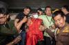 Tampang Ketua Harian KONI Sumsel Tutupi Tangan Diborgol dengan Rompi Tahanan Kejaksaan - Bagian 1