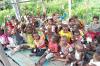 Aksi Sosial Wafer Tango Bagikan Telur Rebus ke Anak-anak Papua - Bagian 1
