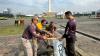 Polri Bersih-bersih Sampah di Monas usai Pesta Rakyat HUT Bhayangkara