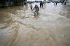 Banjir Rendam Jalanan di India Setelah Diguyur Hujan Deras - Bagian 4