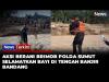 Aksi Heroik Anggota Brimob Polda Sumut Selamatkan Bayi di Tengah Banjir Bandang