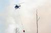 Atasi Karhutla, Pemerintah Siapkan Penyemprotan Cairan Bantuan Brasil dari Helikopter