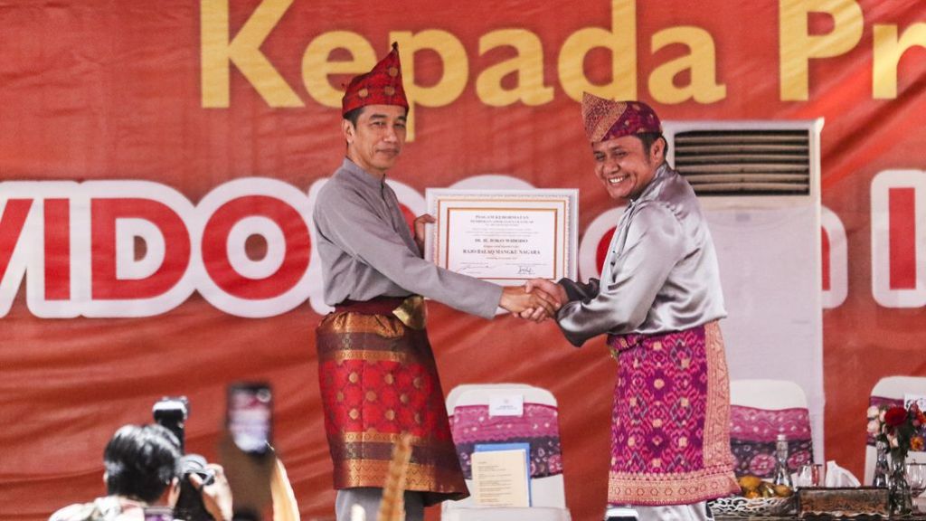 Presiden Jokowi Dianugerahi Gelar Rajo Balaq di Palembang