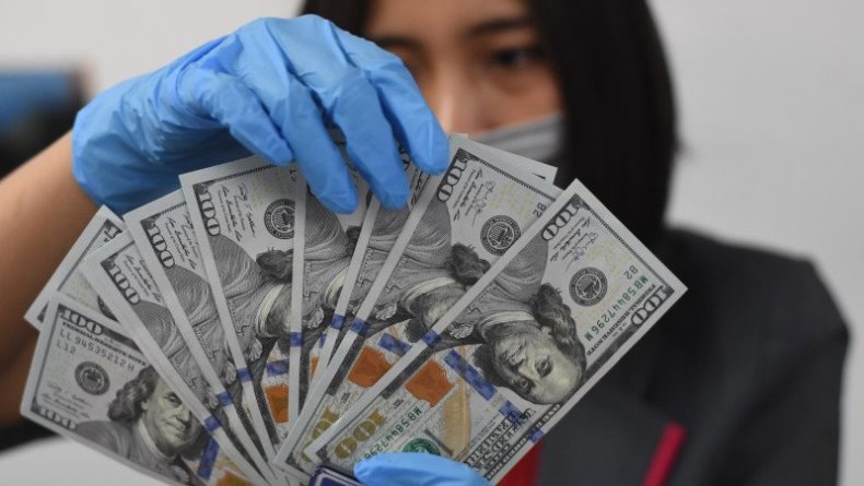 Transaksi Perdagangan Rendah, Dolar AS Menguat Tipis 
