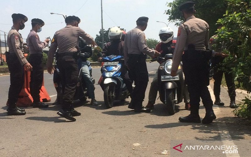 Halau Pemudik, Polisi Perketat Pengamanan di Perbatasan Karawang-Bekasi