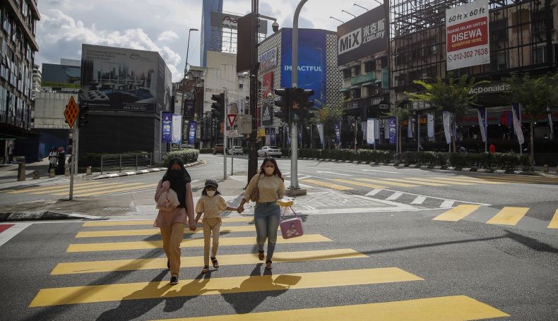 Kasus Covid-19 Meningkat di Malaysia dan Singapura, Epidemiolog Beberkan Sebabnya