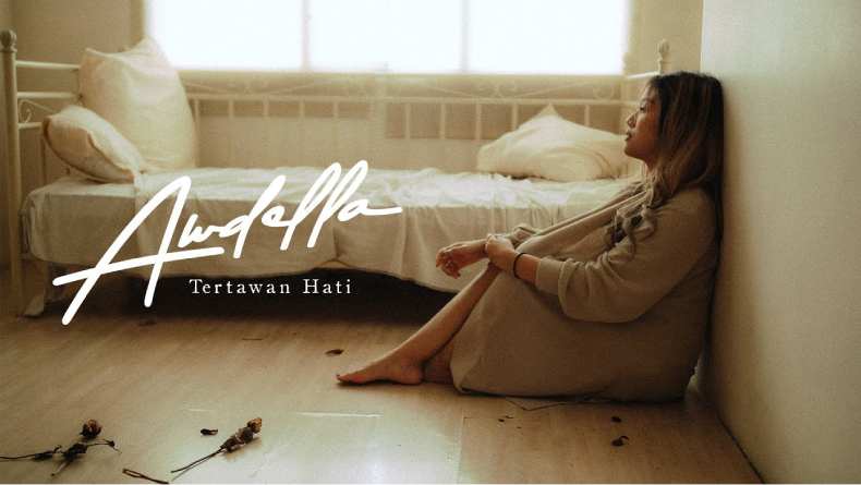 Lirik Lagu Tertawan Hati - Awdella dan Maknanya