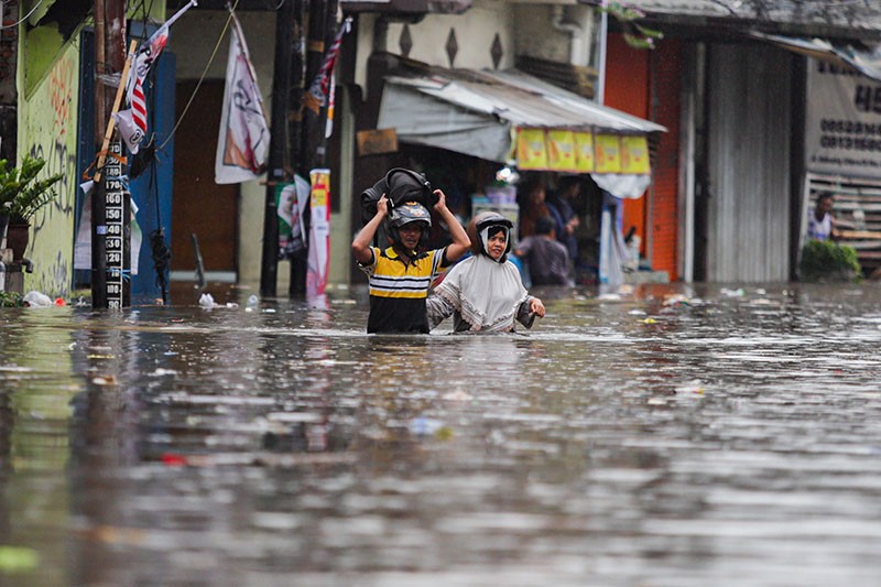 BPBD DKI: 21 RT dan 2 Ruas Jalan Masih Terendam Banjir akibat Hujan Deras