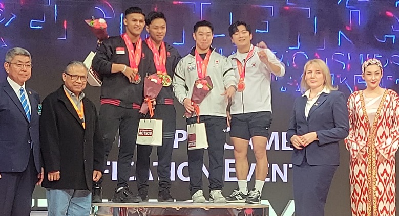 Mantap! Lifter Rahmat Erwin Borong 3 Emas di Kejuaraan Angkat Besi Asia 2024
