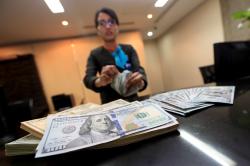 Jelang Data Inflasi, Dolar AS Menghijau