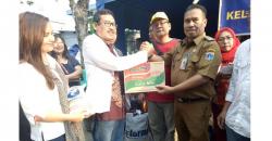 Perindo Salurkan Bantuan untuk Korban Kebakaran di Jembatan Besi