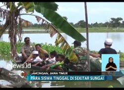 Banjir, Siswa Madrasah di Lamongan Gunakan Perahu ke Sekolah