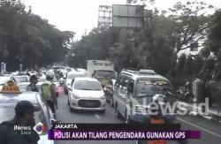 Polisi Akan Tindak Pengguna GPS dan Merokok saat Berkendara