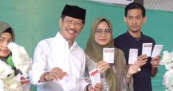 Cagub Sulsel Ichsan Yasin Limpo Bersama Keluarga Mencoblos di TPS 24