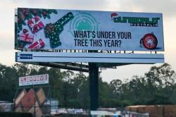 Papan Iklan Tampilkan Pistol sebagai Hadiah Natal Muncul di Brisbane