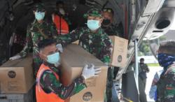 Pesawat TNI AU Angkut Ribuan APD dan Masker untuk Penanganan Corona di Bali<