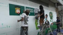 Ingatkan Protokol Kesehatan, Komunitas Mural Medan Lukis Dinding di Jalan Kereta Api