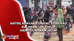 Antre Minyak Goreng di Berau Kalimantan Timur Menggunakan Helm<