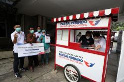   Berikan Gerobak dan Modal Usaha, Partai Perindo Terbukti Turun Tangan Bantu Rakyat Kesusahan<