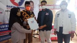 Partai Perindo Salurkan Bantuan Gerobak dan Modal Usaha UMKM di Kota Sukabumi<