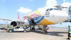 Bawa 128 Penumpang, Thai Air Asia Mendarat Perdana di Bali