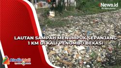 Lautan Sampah Menumpuk Sepanjang 1 Km di Kali Penombo Bekasi