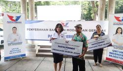 Partai Perindo Bagikan Gerobak untuk Pedagang Bubur Ayam dan Tahu Gejrot
