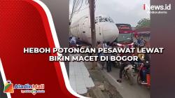 Heboh Potongan Pesawat Lewat Bikin Macet di Bogor