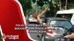 Polisi Selidiki Bule Seksi yang Berjoget dari Jendela Mobil di Karangasem 