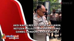 Aksi Kapolres Metro Bekasi Bikin Netizen Meleleh, Amankan Demo Sambil Gendong Anak Kucing
