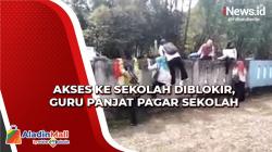 Viral Video Guru Panjat Pagar Sekolah karena Akses Jalan Diblokir di OKI Sumsel<
