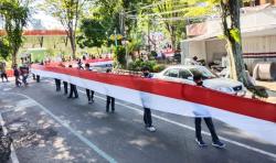 Hari Sumpah Pemuda, Siswa SMA di Salatiga Bentangkan Bendera Merah Putih Sepanjang 1 Km
