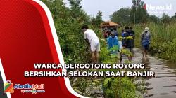 Warga Bergotong Royong Bersihkan Selokan saat Banjir Rendam 3 Perumahan di Indramayu<