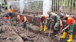 Lanudal Manado Bantu Bersihkan Material Banjir di Desa Klabat Minahasa Utara <