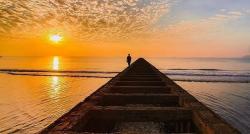 Wisata Pantai Teluk Penyu di Cilacap, Ada Trekdam untuk Berburu Sunset yang Eksotis