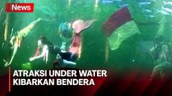 Atraksi Under Water Balerina dan Putri Duyung, Kibarkan Bendera Raksasa