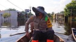 Banjir Rendam Puluhan Titik Lokasi TPS di Rokan Hilir, Kapolres Koordinasi dengan KPU