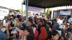 Caleg Perindo Rudi Zulham Sosialisasikan KTA Berasuransi saat Gelar Bazar Murah di Medan<