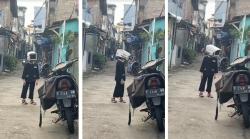Viral Seorang Bocah Pakai Helm Unik Berbentuk CCTV, Netizen: Kamera Pengawas Keliling