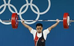 Peraih Emas Asal China Kagum dengan Perjuangan Eko Yuli di Olimpiade 2024: Melihatnya Bikin Haru!