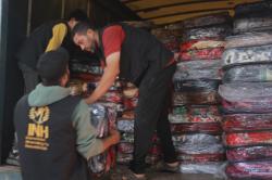 INH Distribusikan Ribuan Selimut Musim Dingin untuk Warga Palestina di Gaza
