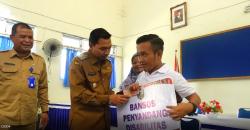 Jelang Lebaran, Ratusan Lansia dan Penyandang Disabilitas Kota Madiun Terima Bansos<