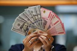 Rupiah Tembus Rp17.409 per Dolar AS